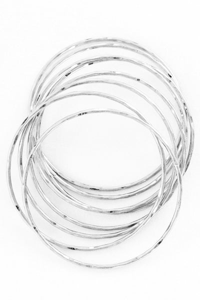 set of eight hammered metal bangles!