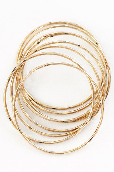 set of eight hammered metal bangles!