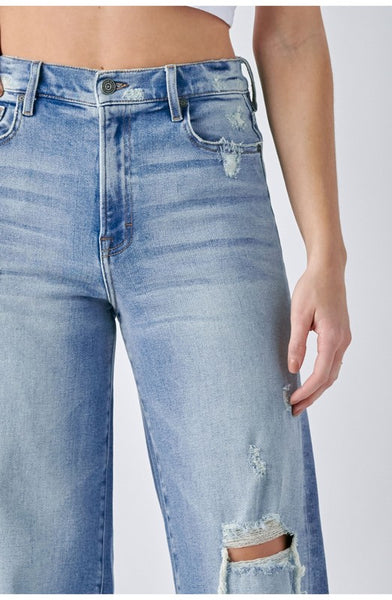 logan high-rise distressed dad jeans | light wash