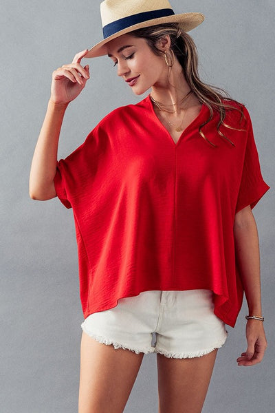 all i know oversized top | fiery red