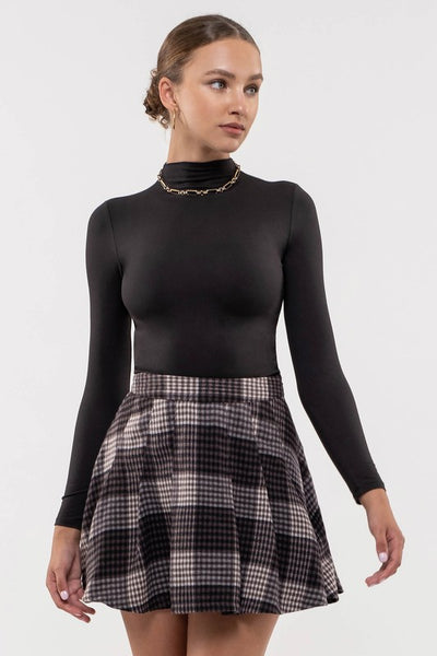 a cut above mock neck top | black