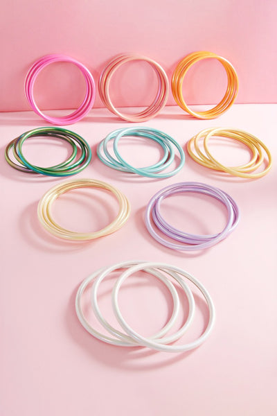 set of three metallic metal bangles!