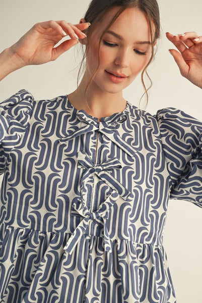 made you blush geometric peplum top | black