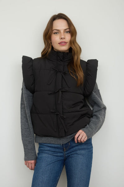 playful pop flutter sleeve bow detail puffer vest | black