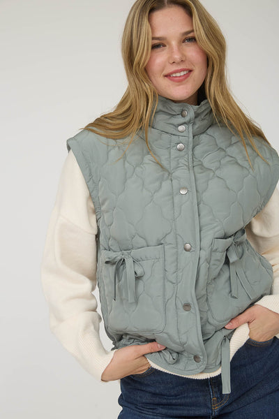 into the groove tie detail quilted puffer vest | dusty sage