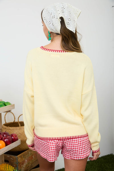 perfectly aligned strawberry motif sweater | butter yellow
