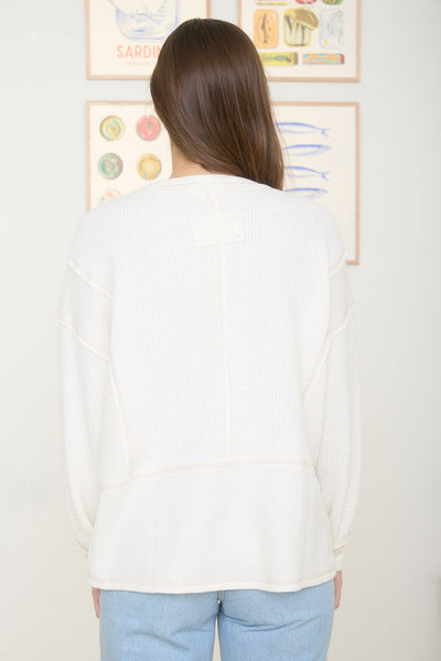 isn't that something raw edge knit top | ivory