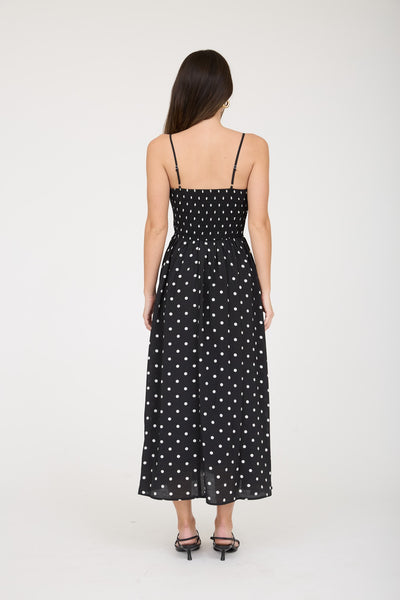 lovely little thing polka dot smocked basque waist midi dress | black