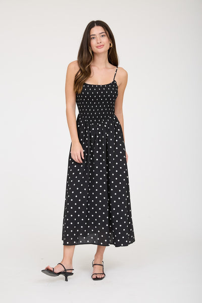 lovely little thing polka dot smocked basque waist midi dress | black