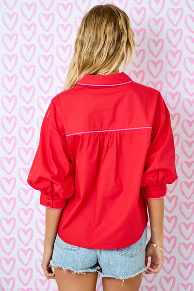 bright on arrival bubble sleeve button down top | red + pink