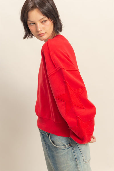 stand corrected star patch sweatshirt | red