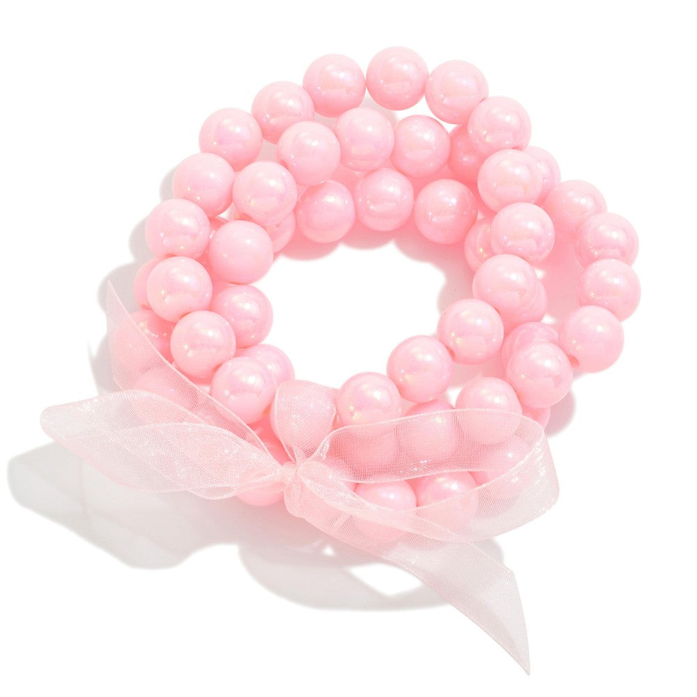set/three pearlescent beaded bracelets | pink