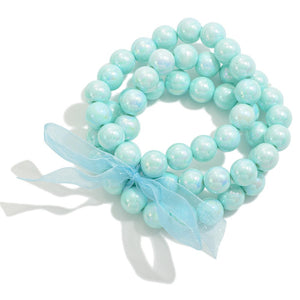 set/three pearlescent beaded bracelets | turquoise