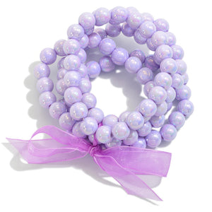 set/five pearlescent beaded bracelets | lavender