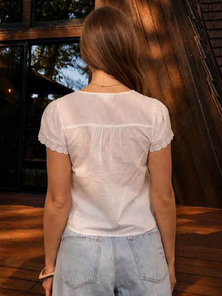 pretty in power embroidered front tie lace trim top | white