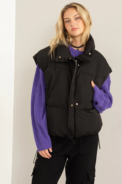 never going home puffer vest | black