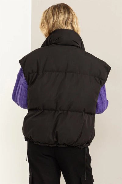 never going home puffer vest | black