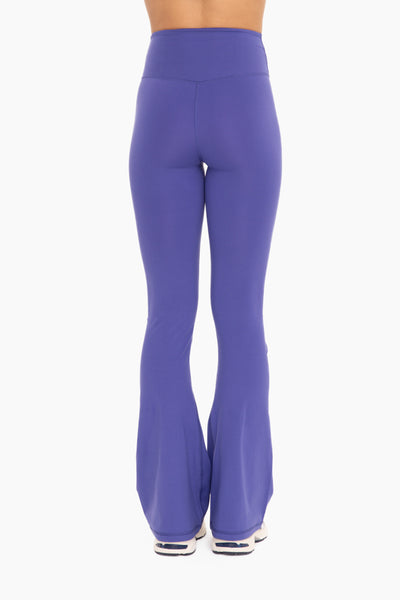 handle my own crossover flare leggings | orient blue