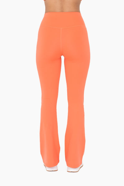 set the pace flare leggings | hot coral