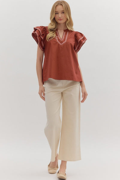 simply sophisticated embroidered flutter sleeve top | brick