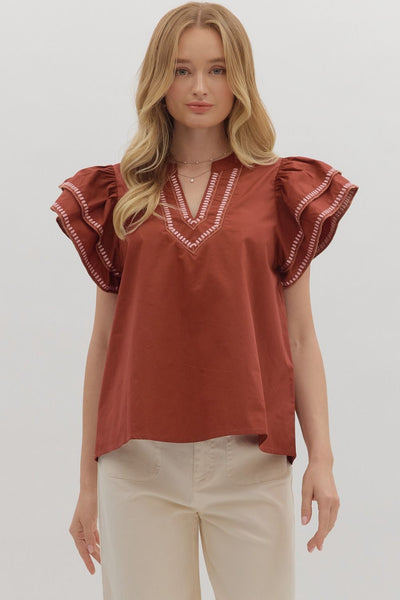 simply sophisticated embroidered flutter sleeve top | brick