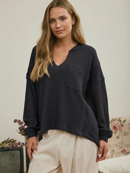 isn't that something raw edge knit top | charcoal