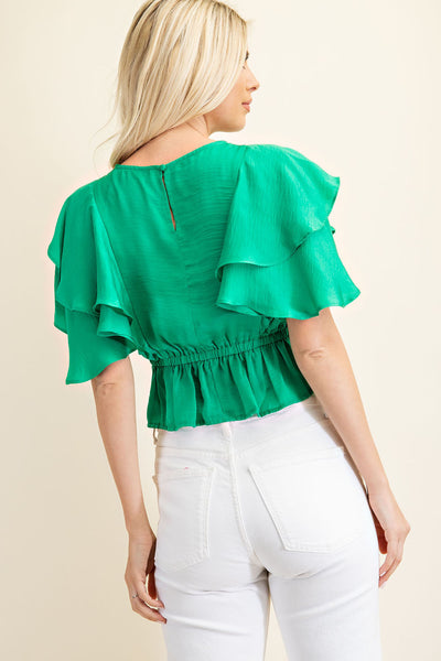 in my favor peplum top | kelly green