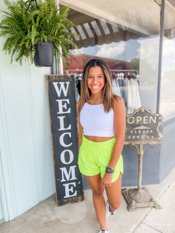 heat wave smocked windbreaker athletic shorts | neon lime